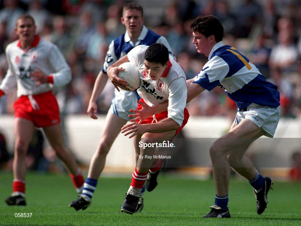 28 September 1997; Darren O'Henlon of Tyrone in action against Mark Hovenden of Laois during the All-Ireland Minor Football Championship Final match between Laois and Tyrone at Croke Park in Dublin. Photo by Ray McManus/Sportsfile