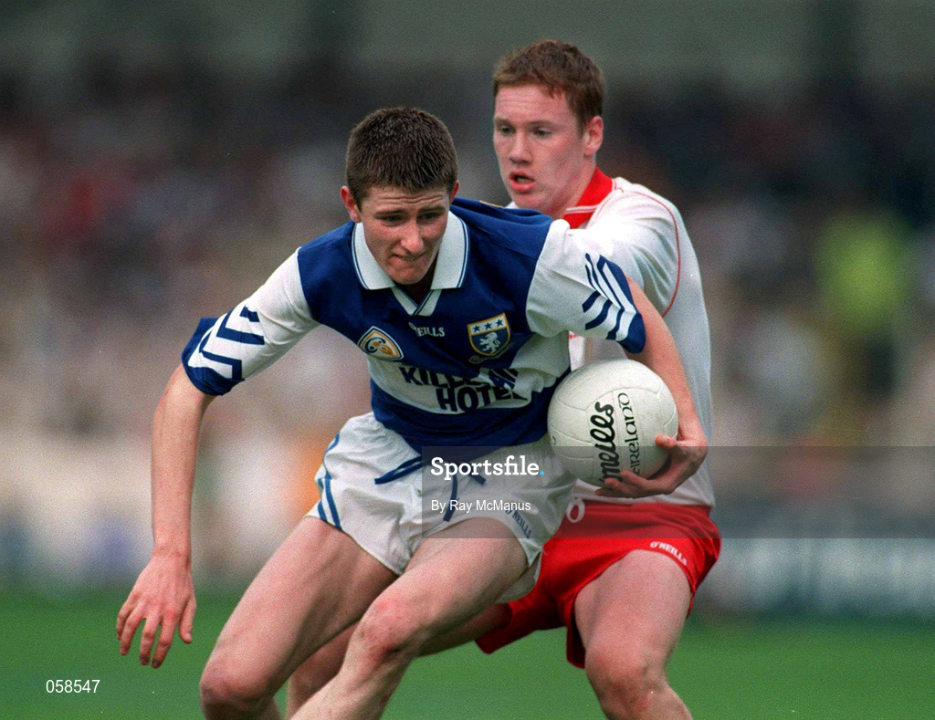28 September 1997; Michael Lambe of Laois in action against Cormac McAnallen of Tyrone during the All-Ireland Minor Football Championship Final match between Laois and Tyrone at Croke Park in Dublin. Photo by Ray McManus/Sportsfile