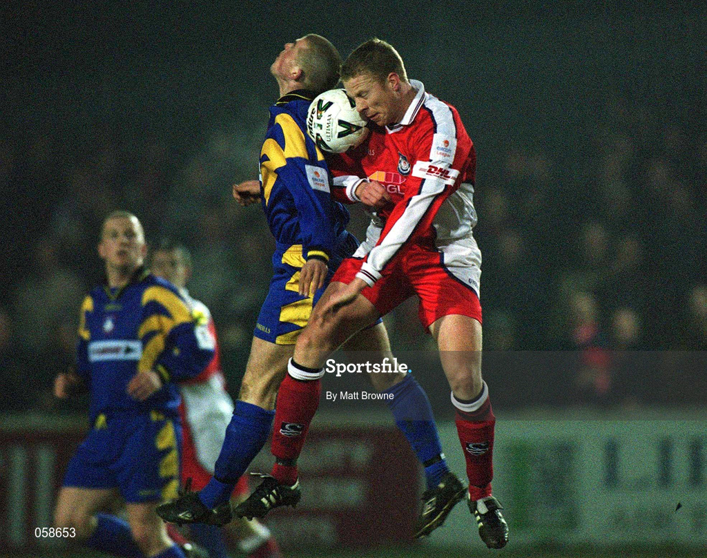 23 March 2001; Stephen Gavin of Longford Town in action against Stephen McGuinness of St Patrick's Athletic during the FAI Harp Lager Cup Third Round Replay match between St Patrick's Athletic and Longford Town at Richmond Park in Dublin. Photo by Matt Browne/Sportsfile