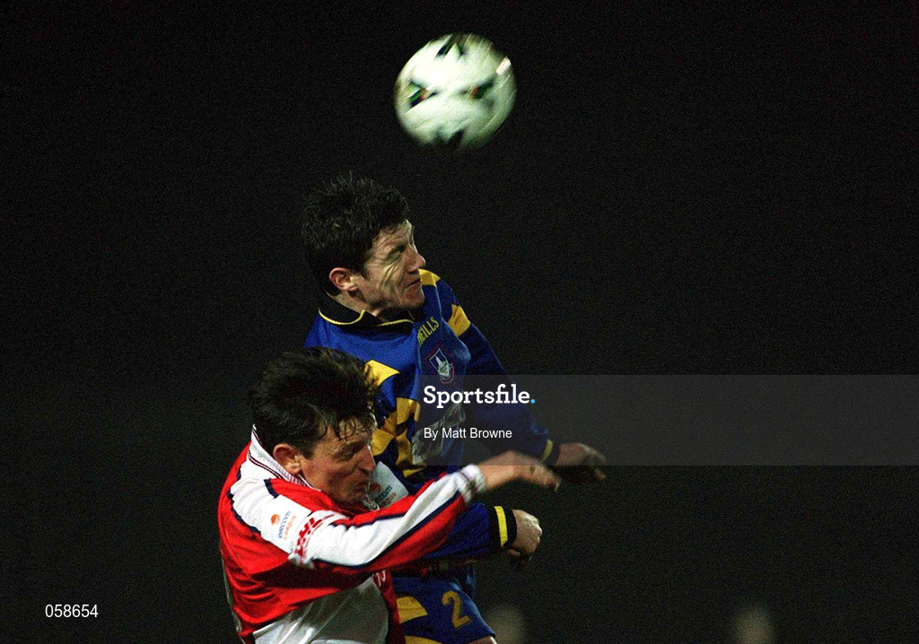 23 March 2001; Alan Murphy of Longford Town in action against Martin Russell of St Patrick's Athletic during the FAI Harp Lager Cup Third Round Replay match between St Patrick's Athletic and Longford Town at Richmond Park in Dublin. Photo by Matt Browne/Sportsfile
