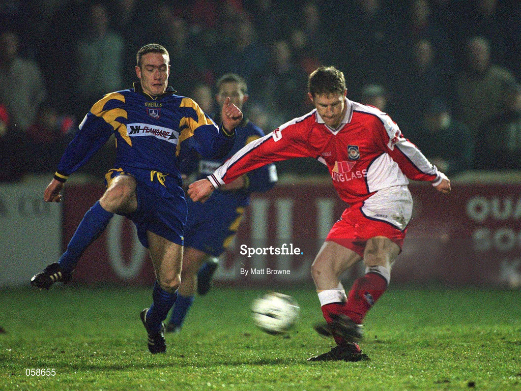 23 March 2001; Robert Griffin of St Patrick's Athletic in action against Shay Zellor of Longford Town during the FAI Harp Lager Cup Third Round Replay match between St Patrick's Athletic and Longford Town at Richmond Park in Dublin. Photo by Matt Browne/Sportsfile