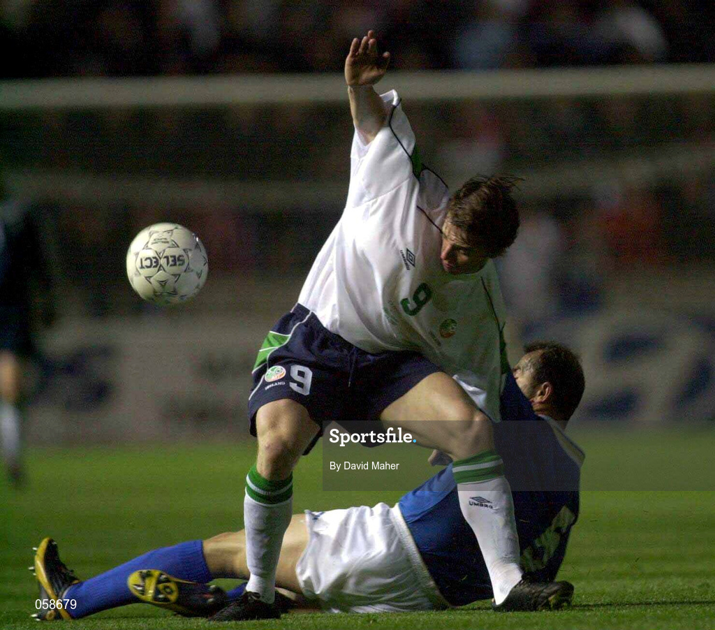 24 March 2001; David Connolly of Republic of Ireland in action against Loakim Loakim of Cyprus during the 2002 FIFA World Cup Qualification Group 2 match between Cyprus and Republic of Ireland at GSP Stadium in Nicosia, Cyprus. Photo by David Maher/Sportsfile
