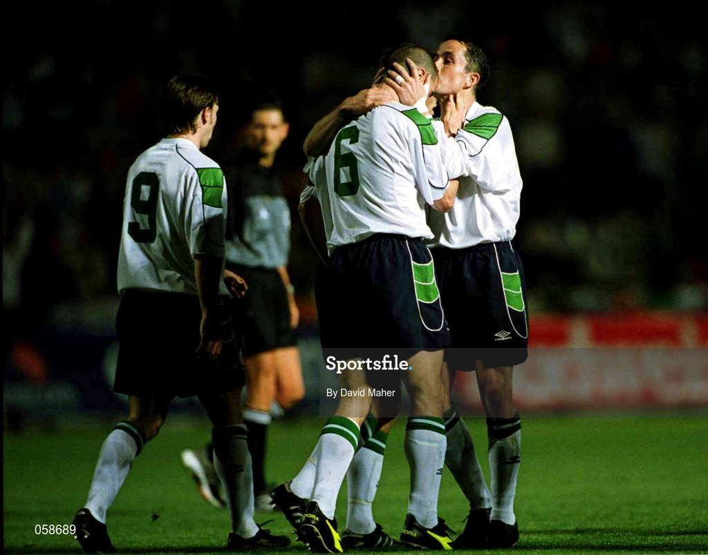 24 March 2000; Roy Keane, 6, of Republic of Ireland is congratulated by team-mate Gary Kelly after scoring his side's fourth goal during the 2002 FIFA World Cup Qualification Group 2 match between Cyprus and Republic of Ireland at GSP Stadium in Nicosia, Cyprus. Photo by David Maher/Sportsfile