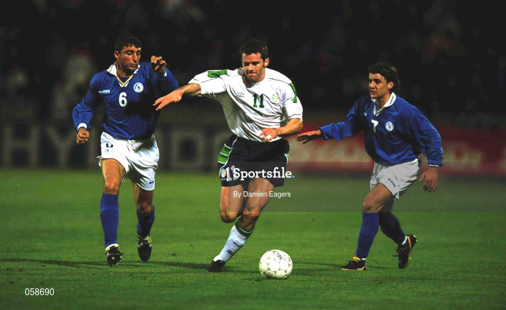 24 March 2000; Kevin Kilbane of Republic of Ireland in action against Pounnas Panagiotis, left, and Theodotou Georgis of Cyprus during the 2002 FIFA World Cup Qualification Group 2 match between Cyprus and Republic of Ireland at GSP Stadium in Nicosia, Cyprus. Photo by Damien Eagers/Sportsfile