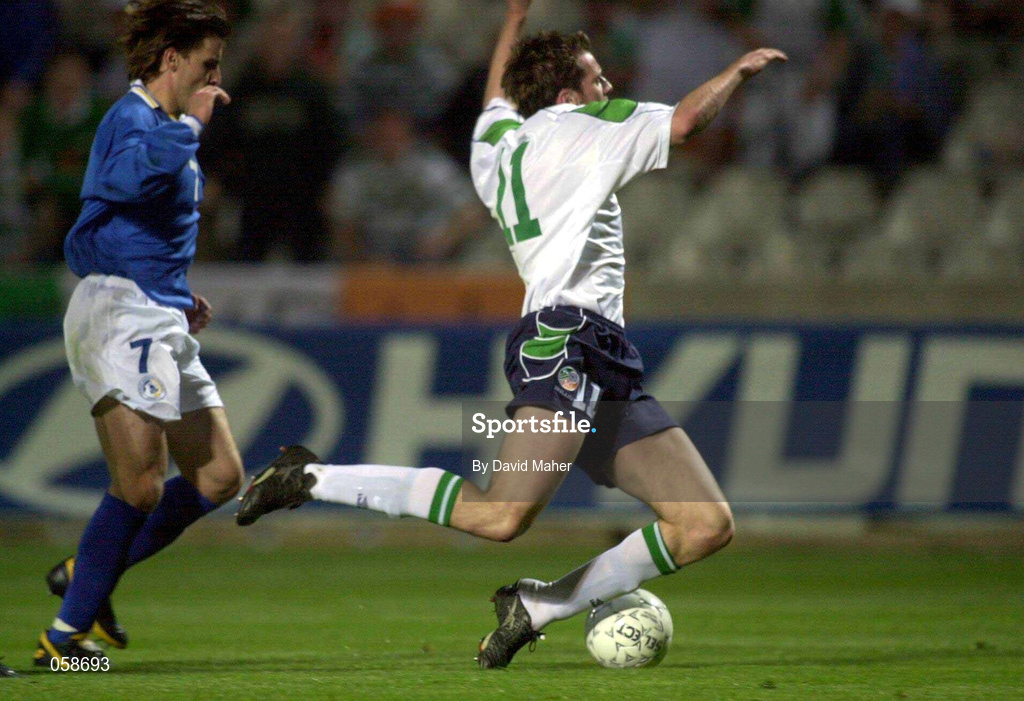 24 March 2001; Kevin Kilbane of Republic of Ireland is tackled by Georgios Theodotou of Cyprus which led to penalty been awarded during the 2002 FIFA World Cup Qualification Group 2 match between Cyprus and Republic of Ireland at GSP Stadium in Nicosia, Cyprus. Photo by David Maher/Sportsfile