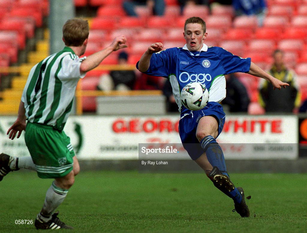 25 March 2001; Kevin McHugh of Finn Harps in action against Stephen Gifford of Bray Wanderers during the Eircom League Premier Division match between Bray Wanderers and Finn Harps at the Carlisle Grounds in Bray, Wicklow. Photo by Ray Lohan/Sportsfile