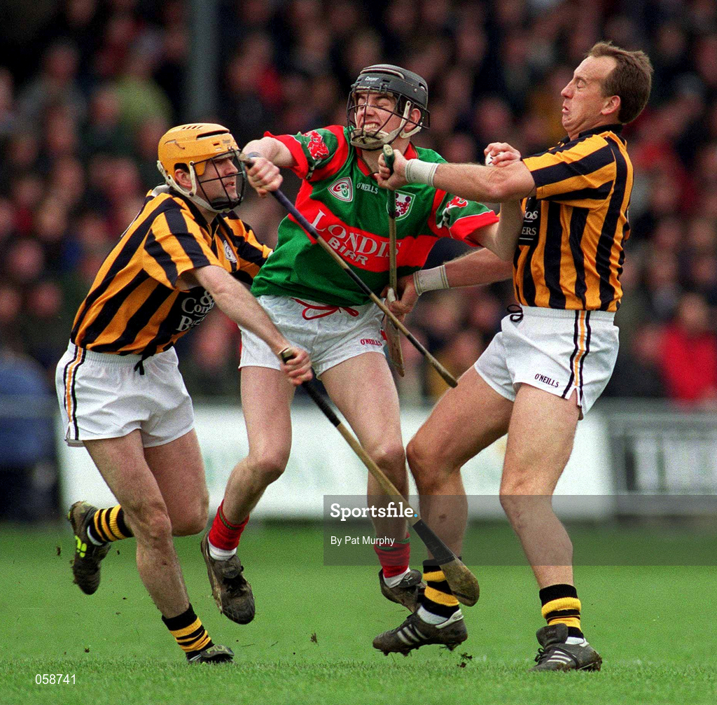 25 March 2001; Rory Hanniffy of Birr is tackled by Damien Murphy, left, and Joe Dooley of Seir Kieran during the Offaly County Senior Hurling Championship Final match between Birr and Seir Kieran at St Brendan's Park in Birr, Offaly. Photo by Pat Murphy/Sportsfile