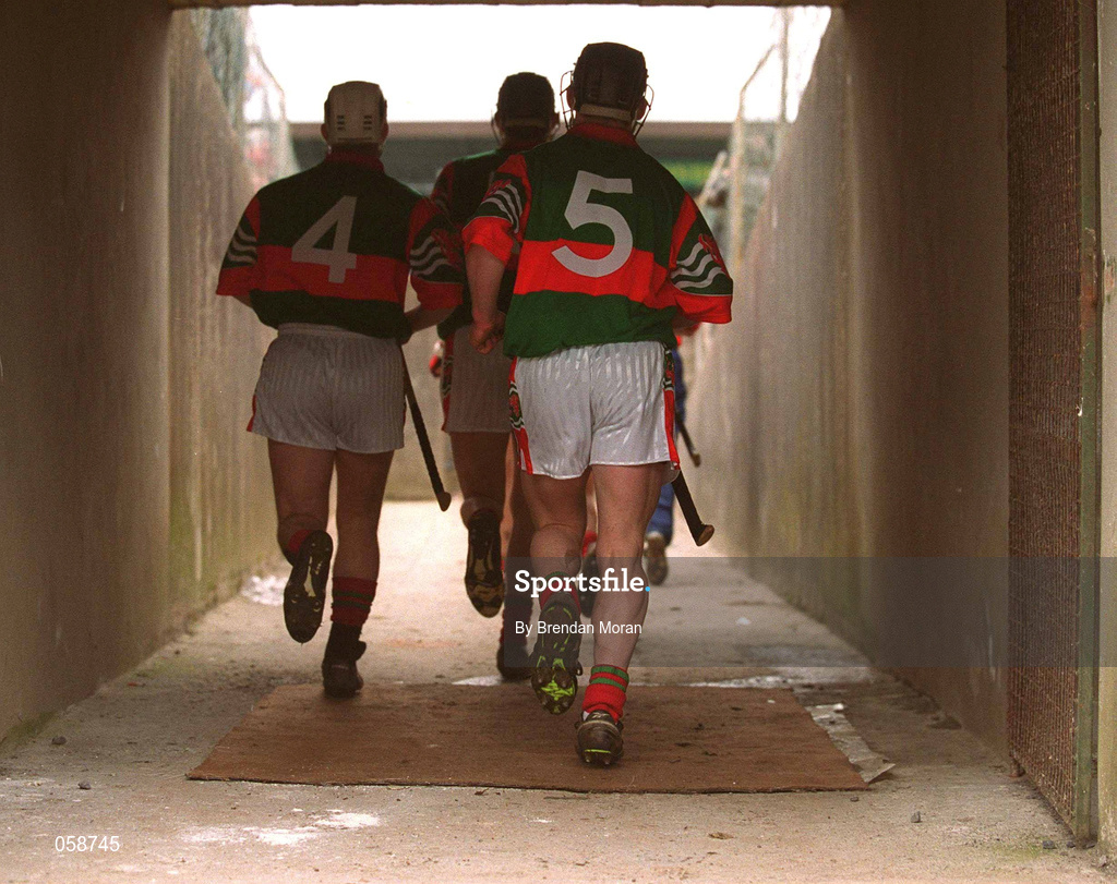 25 March 2001; The Birr players walk over an disinfectant matt as they make their way onto the field before the Offaly County Senior Hurling Championship Final match between Birr and Seir Kieran at St Brendan's Park in Birr, Offaly. Photo by Brendan Moran/Sportsfile