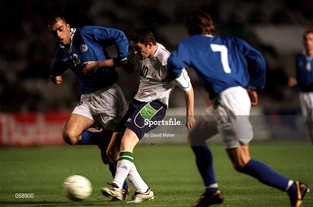 24 March 2001; Robbie Keane of Republic of Ireland in action against Filippos Filippou of Cyprus, left, during the 2002 FIFA World Cup Qualification Group 2 match between Cyprus and Republic of Ireland at GSP Stadium in Nicosia, Cyprus. Photo by David Maher/Sportsfile
