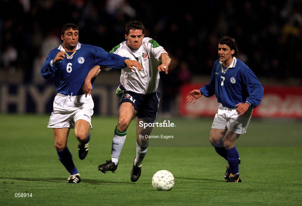 24 March 2001; Kevin Kilbane of Republic of Ireland in action against Panagiotis Pounnas, left, and Georgis Theodotou of Cyprus during the 2002 FIFA World Cup Qualification Group 2 match between Cyprus and Republic of Ireland at GSP Stadium in Nicosia, Cyprus. Photo by Damien Eagers/Sportsfile