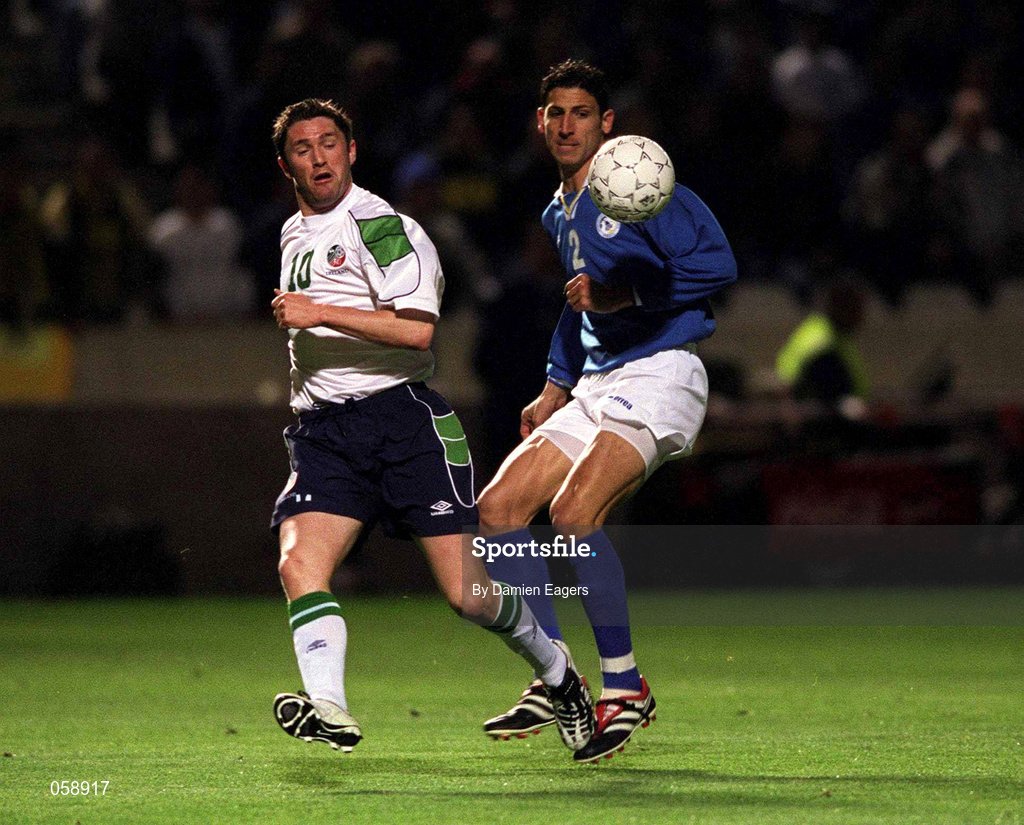 24 March 2001; Robbie Keane of Republic of Ireland in action against Petros Konnafis of Cyprus during the 2002 FIFA World Cup Qualification Group 2 match between Cyprus and Republic of Ireland at GSP Stadium in Nicosia, Cyprus. Photo by Damien Eagers/Sportsfile