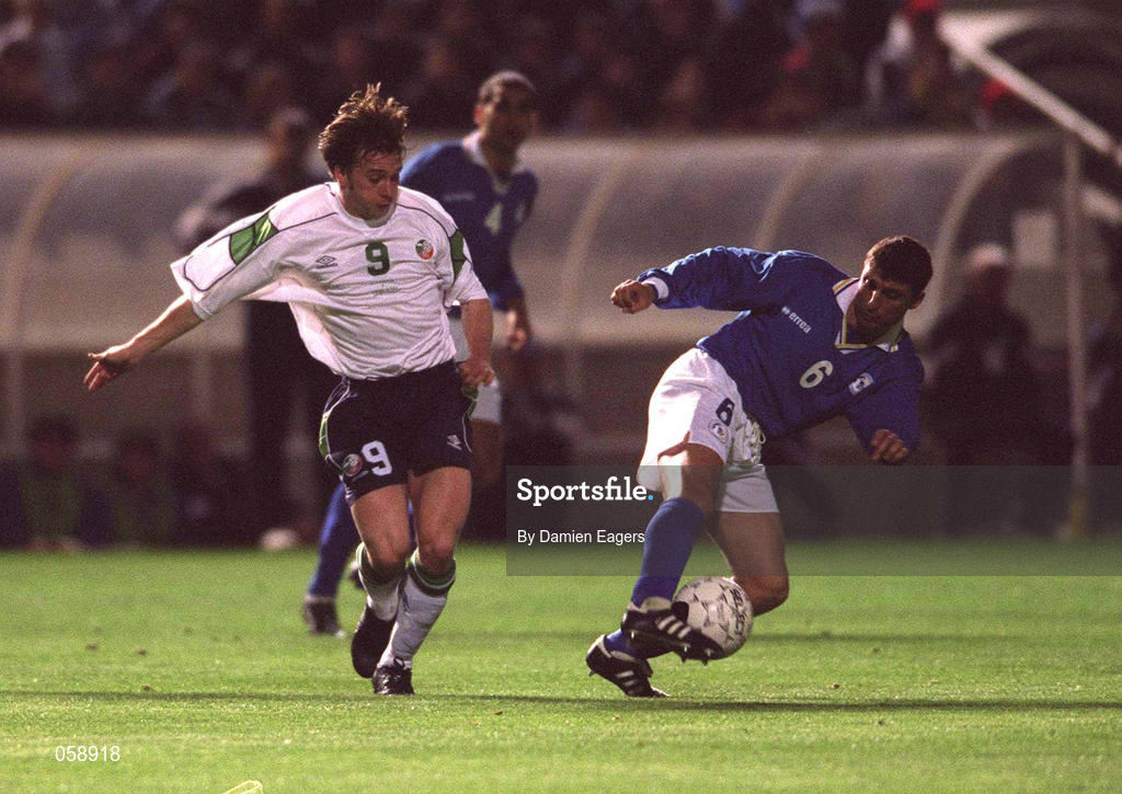 24 March 2001; Panagiotis Pounnas of Cyprus in action against David Connolly of Republic of Ireland during the 2002 FIFA World Cup Qualification Group 2 match between Cyprus and Republic of Ireland at GSP Stadium in Nicosia, Cyprus. Photo by Damien Eagers/Sportsfile