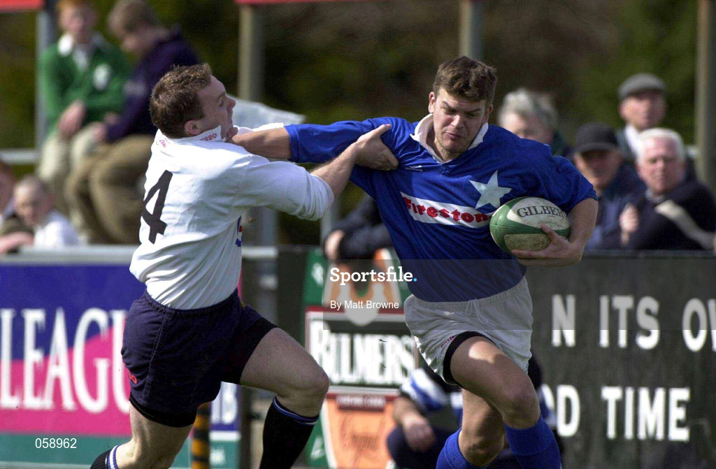 31 March 2001; John McWeeney of St Mary's is tackled by John Kelly of Cork Constitution during the AIB All-Ireland League Division 1 match between Cork Constitution RFC and St Mary's RFC at Temple Hill in Cork. Photo by Matt Browne/Sportsfile