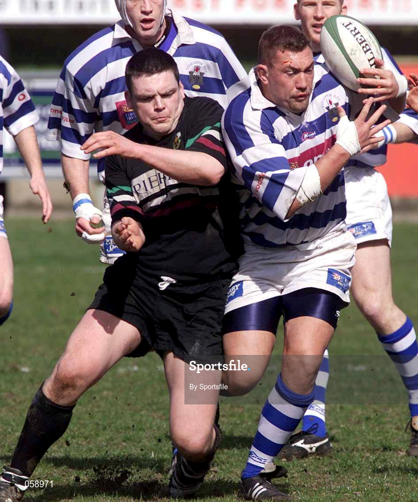 31 March 2001; Justin Fitzpatrick of Dungannon is tackled by S Stephens of DLSP during the AIB All-Ireland League Division 1 match between Dungannon RFC and DLSP RFC at Stevenson Park in Dungannon, Tyrone. Photo by Sportsfile