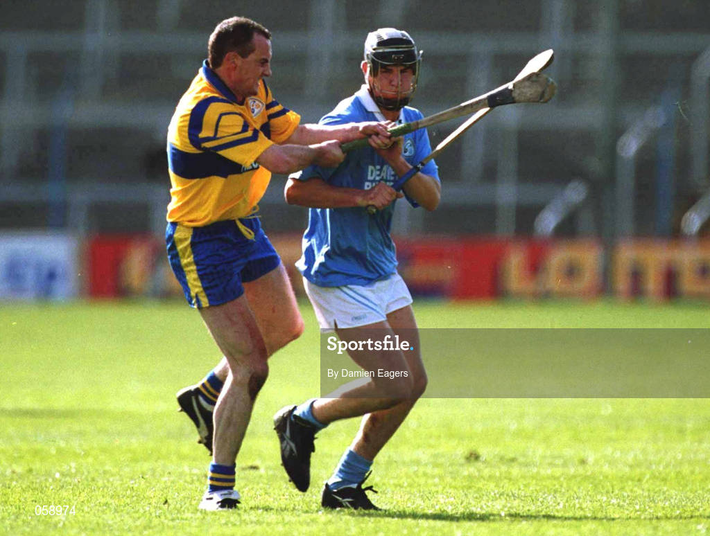 31 March 2001; John Hoyne of Graigue Ballycallan in action against Alan Mulready of Sixmilebridge during the AIB All-Ireland Senior Club Hurling Championship Semi-Final Replay match between Graigue Ballycallan and Sixmilebridge at Semple Stadium in Thurles, Tipperary. Photo by Damien Eagers/Sportsfile