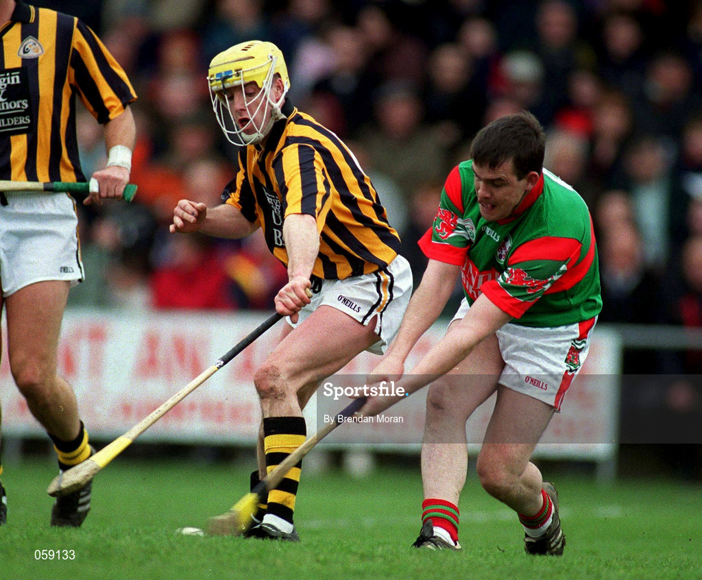25 March 2001; Johnny Pilkington of Birr in action against Finbar O'Neill of Seir Kieran during the Offaly County Senior Hurling Championship Final match between Birr and Seir Kieran at St Brendan's Park in Birr, Offaly. Photo by Brendan Moran/Sportsfile