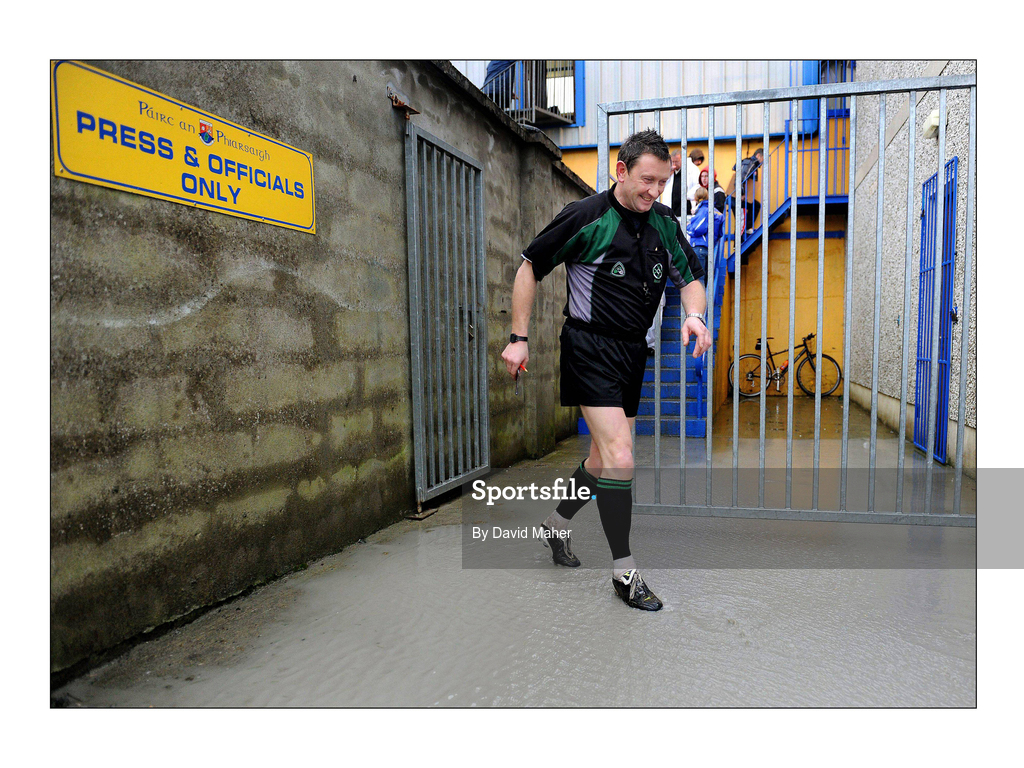 11 January 2009; Referee Pat Fox walks through a flooded area on his way back to the pitch for the second half of the game. O'Byrne Cup Quarter-Final, Longford v Louth, Pearse Park, Longford. Picture credit: David Maher / SPORTSFILE