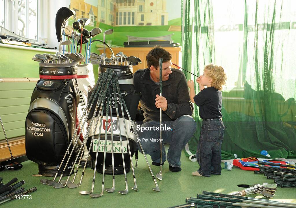 17 December 2009; Padraig Harrington pictured with his son Ciaran, age 2, at his home with clubs and equipment which is to be sold in Dundrum Shopping Centre this Saturday to raise funds for GOAL. Rathmichael, Dublin. Picture credit: Pat Murphy / SPORTSFILE
