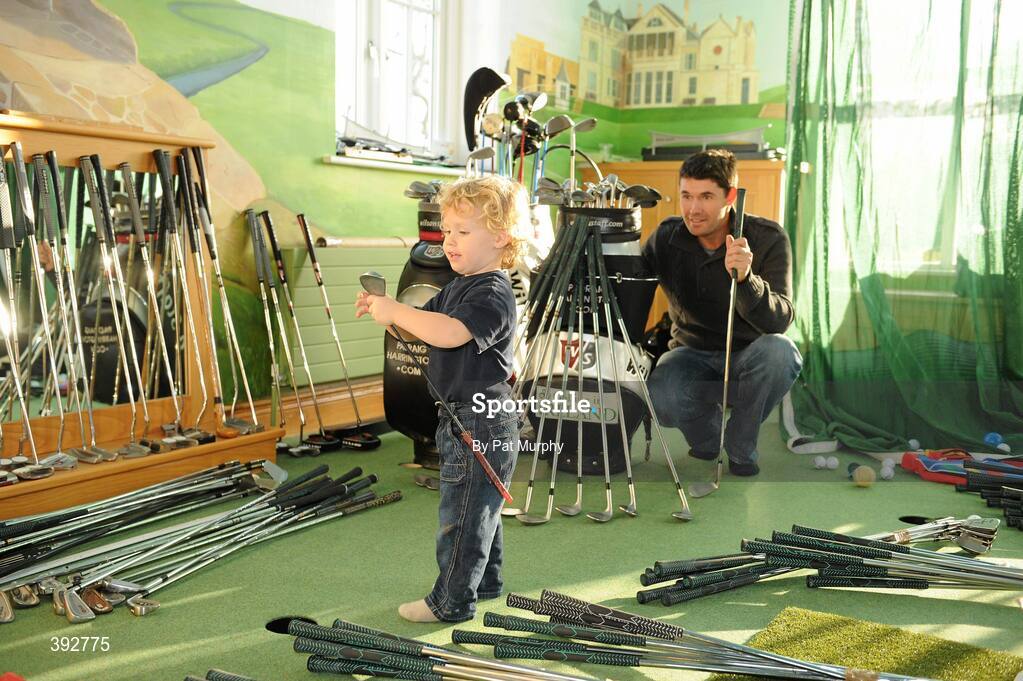17 December 2009; Padraig Harrington pictured with his son Ciaran, age 2, at his home with clubs and equipment which is to be sold in Dundrum Shopping Centre this Saturday to raise funds for GOAL. Rathmichael, Dublin. Picture credit: Pat Murphy / SPORTSFILE