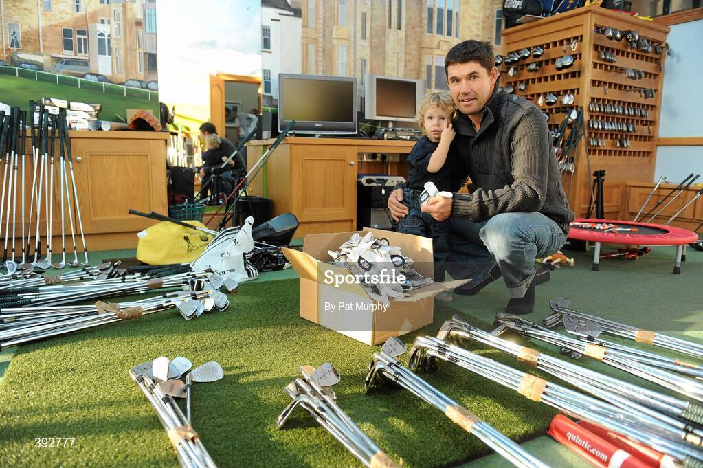 17 December 2009; Padraig Harrington pictured with his son Ciaran, age 2, at his home with clubs and equipment which is to be sold in Dundrum Shopping Centre this Saturday to raise funds for GOAL. Rathmichael, Dublin. Picture credit: Pat Murphy / SPORTSFILE
