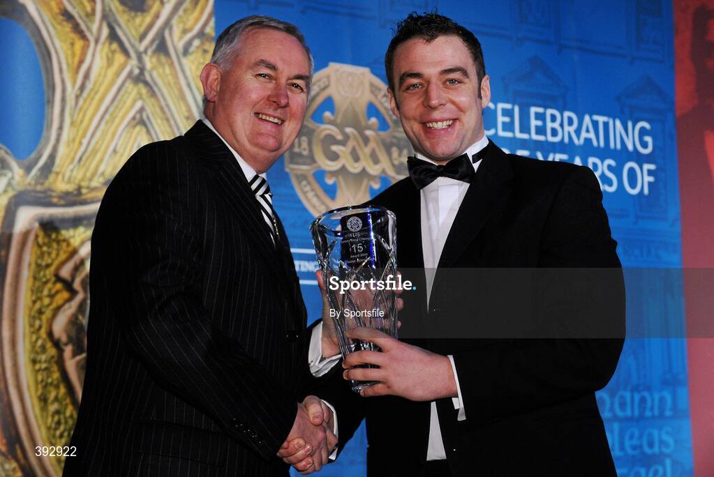 19 December 2009; Shane Kavanagh, Carlow, is presented with his Christy Ring Award by Uachtarán CLG Criostóir Ó Cuana. Christy Ring/Nicky Rackard/Lory Meagher Champion 15 & Rounder All-Star Awards 2009, Croke Park, Dublin. Photo by Sportsfile