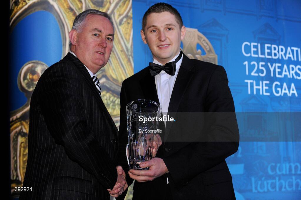 19 December 2009; John Rogers, Carlow, is presented with his Christy Ring Award by Uachtarán CLG Criostóir Ó Cuana. Christy Ring/Nicky Rackard/Lory Meagher Champion 15 & Rounder All-Star Awards 2009, Croke Park, Dublin. Photo by Sportsfile