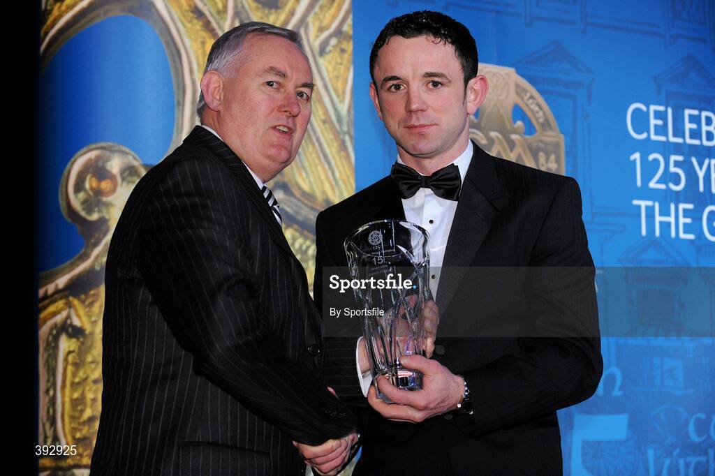 19 December 2009; James Hickey, Carlow, is presented with his Christy Ring Award by Uachtarán CLG Criostóir Ó Cuana. Christy Ring/Nicky Rackard/Lory Meagher Champion 15 & Rounder All-Star Awards 2009, Croke Park, Dublin. Photo by Sportsfile