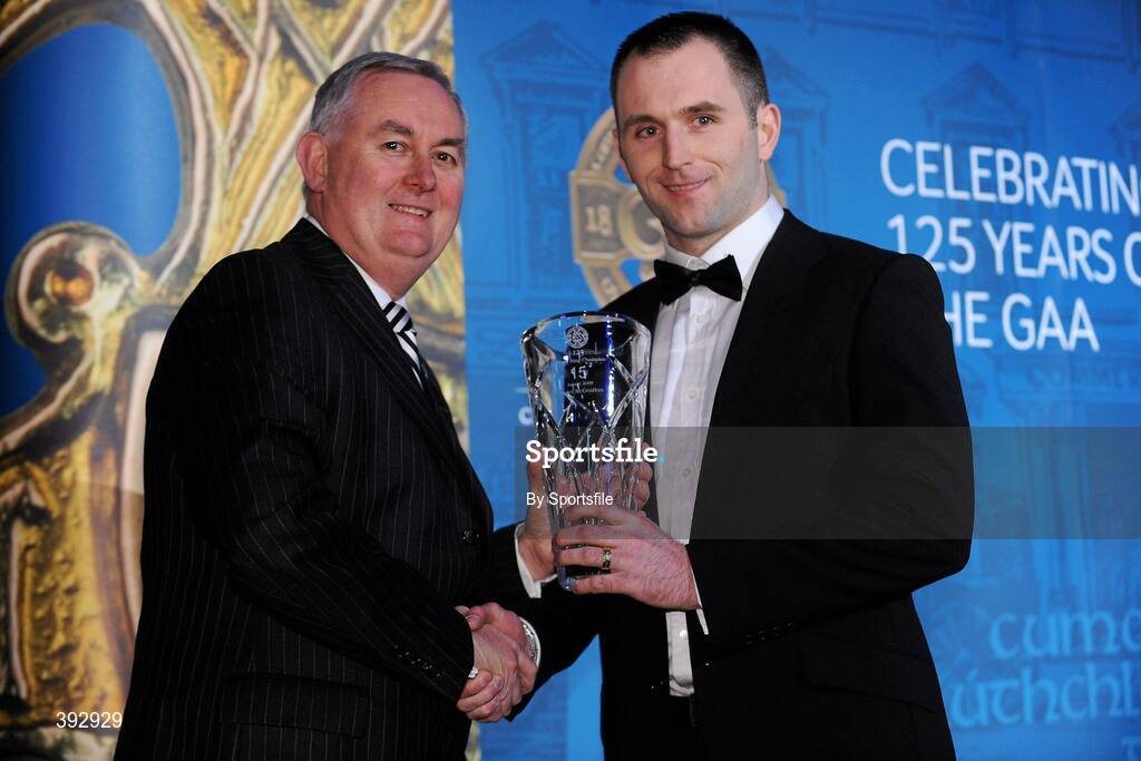 19 December 2009; Ruari McGrattan, Down, is presented with his Christy Ring Award by Uachtarán CLG Criostóir Ó Cuana. Christy Ring/Nicky Rackard/Lory Meagher Champion 15 & Rounder All-Star Awards 2009, Croke Park, Dublin. Photo by Sportsfile