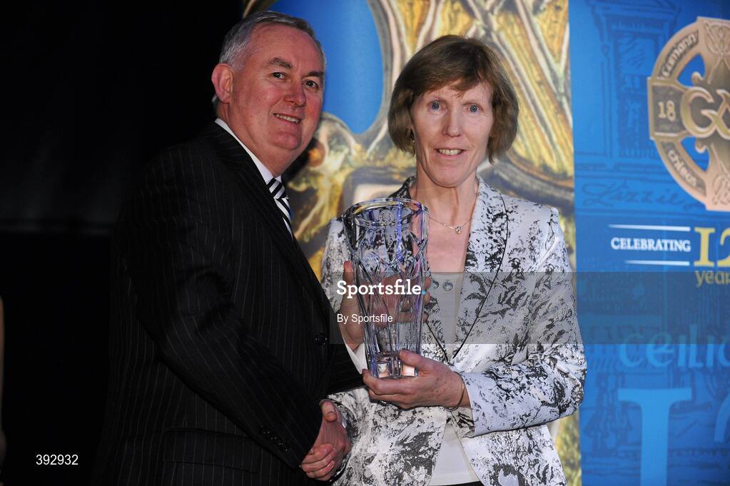 19 December 2009; Margaret Freeman accepts the Christy Ring Award on behalf of her son Adrian Freeman, Mayo, from Uachtarán CLG Criostóir Ó Cuana. Christy Ring/Nicky Rackard/Lory Meagher Champion 15 & Rounder All-Star Awards 2009, Croke Park, Dublin. Photo by Sportsfile