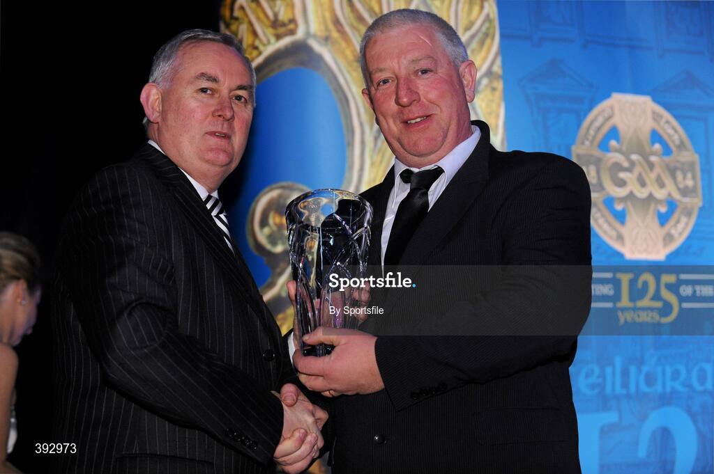 19 December 2009; Gerard Donnelly accepts the Lory Meagher Champion 15 Award on behalf of his son Stephen Donnelly, Tyrone, from Uachtarán CLG Criostóir Ó Cuana. Christy Ring/Nicky Rackard/Lory Meagher Champion 15 & Rounder All-Star Awards 2009, Croke Park, Dublin. Photo by Sportsfile