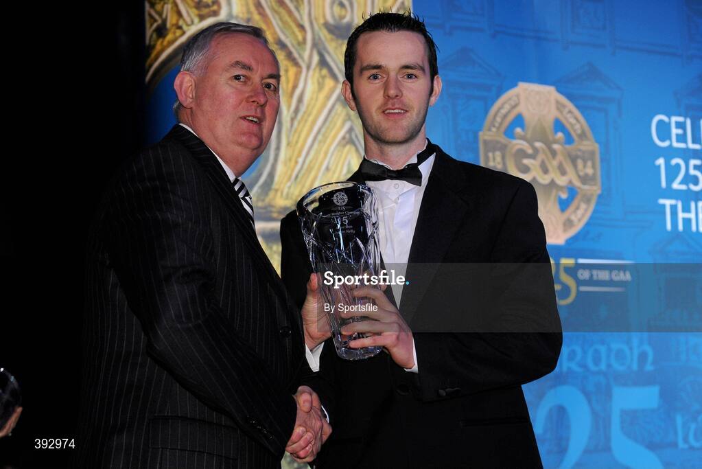 19 December 2009; Justin Kelly, Tyrone, is presented with his Lory Meagher Champion 15 Award by Uachtarán CLG Criostóir Ó Cuana. Christy Ring/Nicky Rackard/Lory Meagher Champion 15 & Rounder All-Star Awards 2009, Croke Park, Dublin. Photo by Sportsfile