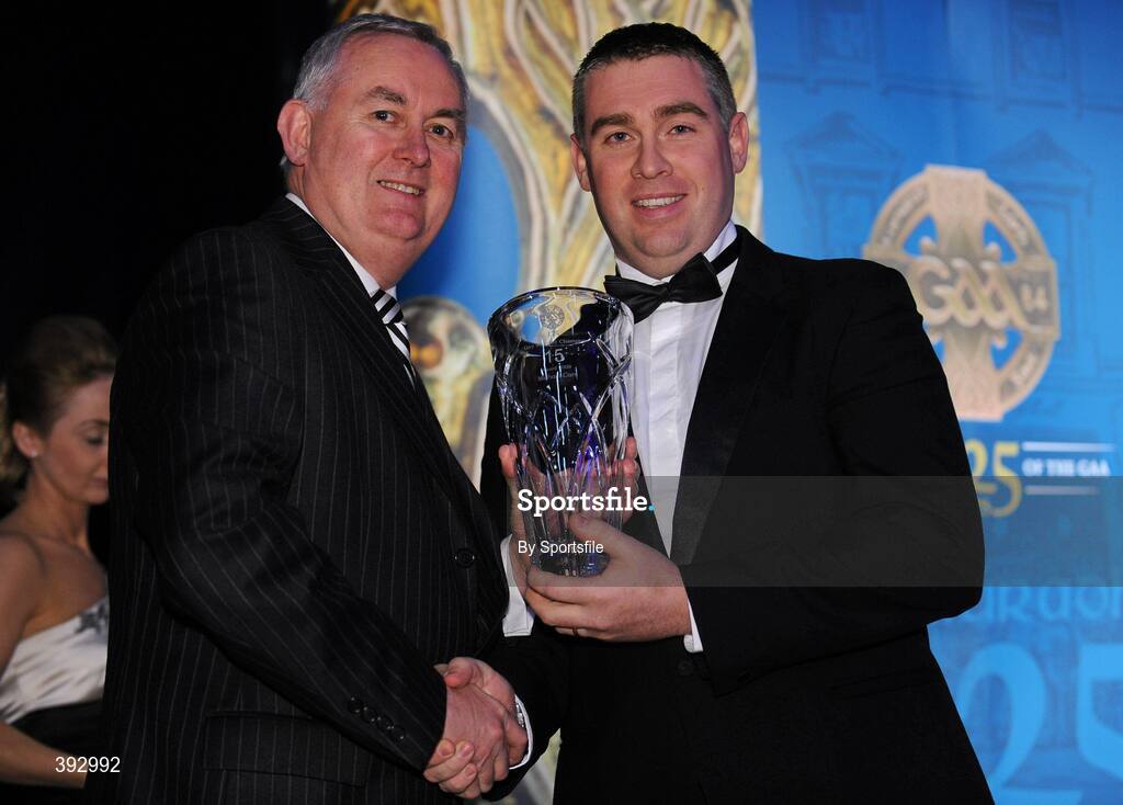 19 December 2009; Michael Power, Cavan, is presented with his Lory Meagher Champion 15 Award by Uachtarán CLG Criostóir Ó Cuana. Christy Ring/Nicky Rackard/Lory Meagher Champion 15 & Rounder All-Star Awards 2009, Croke Park, Dublin. Photo by Sportsfile