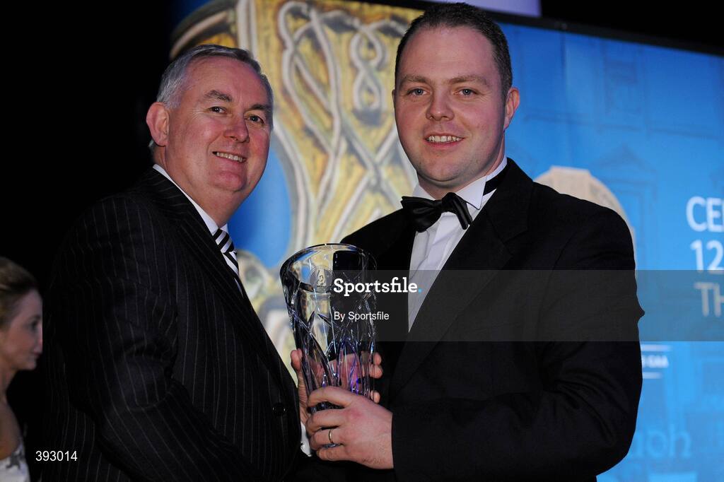 19 December 2009; Gary Reilly, Erne Eagles Rounders Club, Cavan, is presented with his Rounders All-Star Award by Uachtarán CLG Criostóir Ó Cuana. Christy Ring/Nicky Rackard/Lory Meagher Champion 15 & Rounder All-Star Awards 2009, Croke Park, Dublin. Photo by Sportsfile