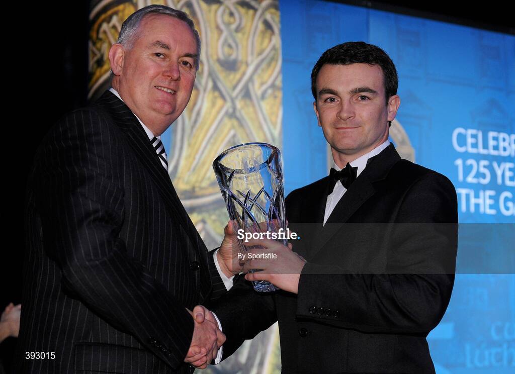 19 December 2009; Sean Hughes, Erne Eagles Rounders Club, Cavan, is presented with his Rounders All-Star Award by Uachtarán CLG Criostóir Ó Cuana. Christy Ring/Nicky Rackard/Lory Meagher Champion 15 & Rounder All-Star Awards 2009, Croke Park, Dublin. Photo by Sportsfile