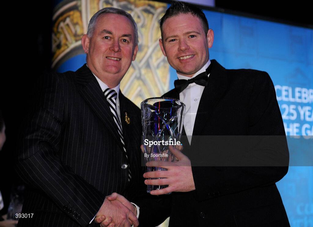 19 December 2009; James McKeown, St. Clare's Rounders Club, Cavan, is presented with his Rounders All-Star Award by Uachtarán CLG Criostóir Ó Cuana. Christy Ring/Nicky Rackard/Lory Meagher Champion 15 & Rounder All-Star Awards 2009, Croke Park, Dublin. Photo by Sportsfile