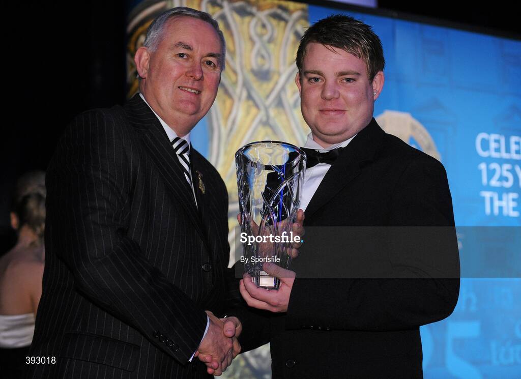 19 December 2009; Stephen Bury, St. Clare's Rounders Club, Cavan, is presented with his Rounders All-Star Award by Uachtarán CLG Criostóir Ó Cuana. Christy Ring/Nicky Rackard/Lory Meagher Champion 15 & Rounder All-Star Awards 2009, Croke Park, Dublin. Photo by Sportsfile