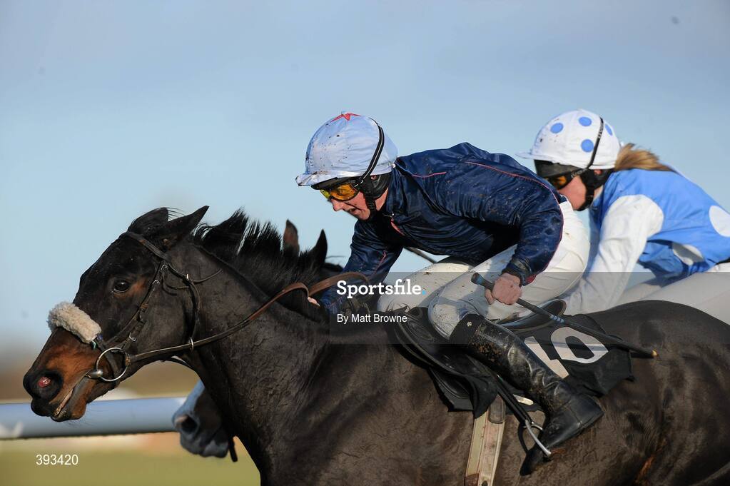 20 December 2009; Quarryfield Lass, with Conor Maxwell up, on their way to winning the I.N.H. Stallion Owners European Breeders Fund Maiden Hurdle after jumping the last from second place Culmullen Hall, with Jill Geraghty up. Thurles Racecourse, Thurles, Co. Tipperary. Picture credit: Matt Browne / SPORTSFILE