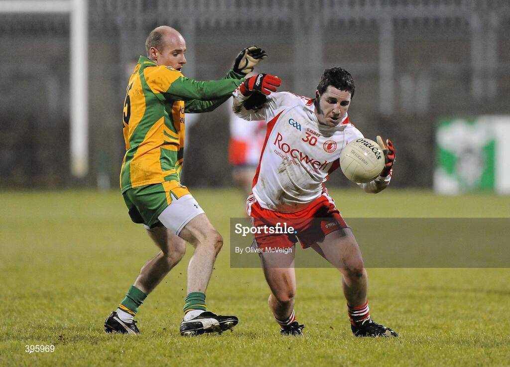 20 January 2010; Gareth Devlin, Tyrone, in action against James Keeney, Donegal. Barrett Sports Lighting Dr. McKenna Cup, Group B, Donegal v Tyrone, MacCumhaill Park, Ballybofey, Co. Donegal. Picture credit: Oliver McVeigh / SPORTSFILE