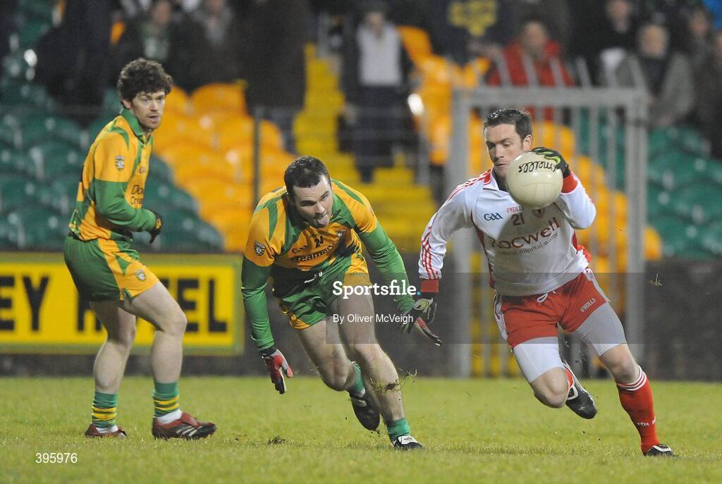 20 January 2010; Martin Penrose, Tyrone, in action against Neil McGee, Donegal. Barrett Sports Lighting Dr. McKenna Cup, Group B, Donegal v Tyrone, MacCumhaill Park, Ballybofey, Co. Donegal. Picture credit: Oliver McVeigh / SPORTSFILE