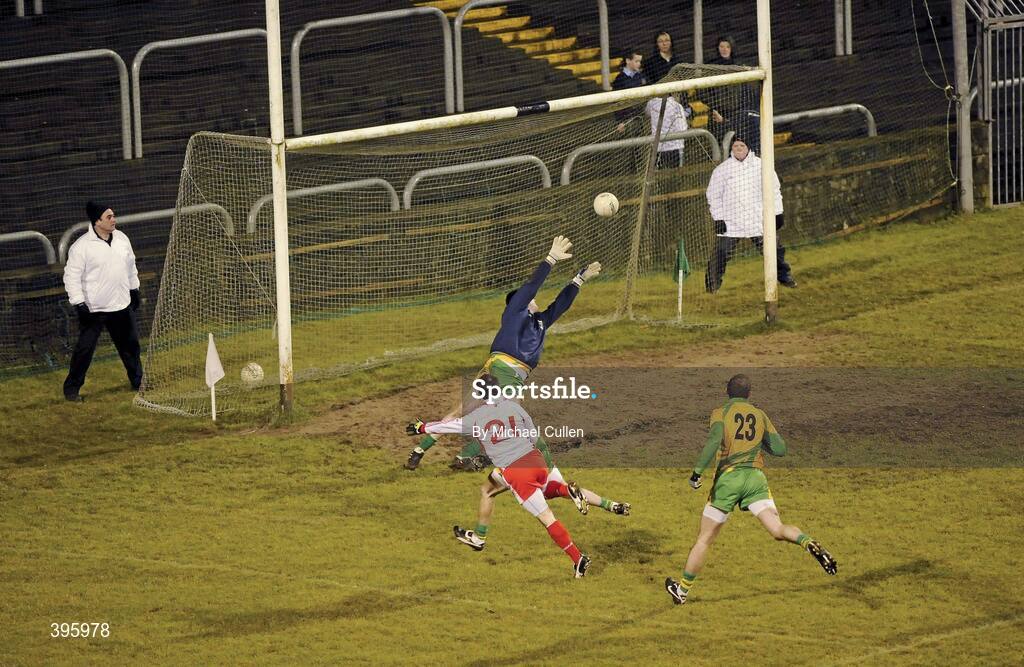 20 January 2010; Martin Penrose, Tyrone, scores his second goal past Paul Durcan, Donegal. Barrett Sports Lighting Dr. McKenna Cup, Group B, Donegal v Tyrone, MacCumhaill Park, Ballybofey, Co. Donegal. Picture credit: Michael Cullen / SPORTSFILE