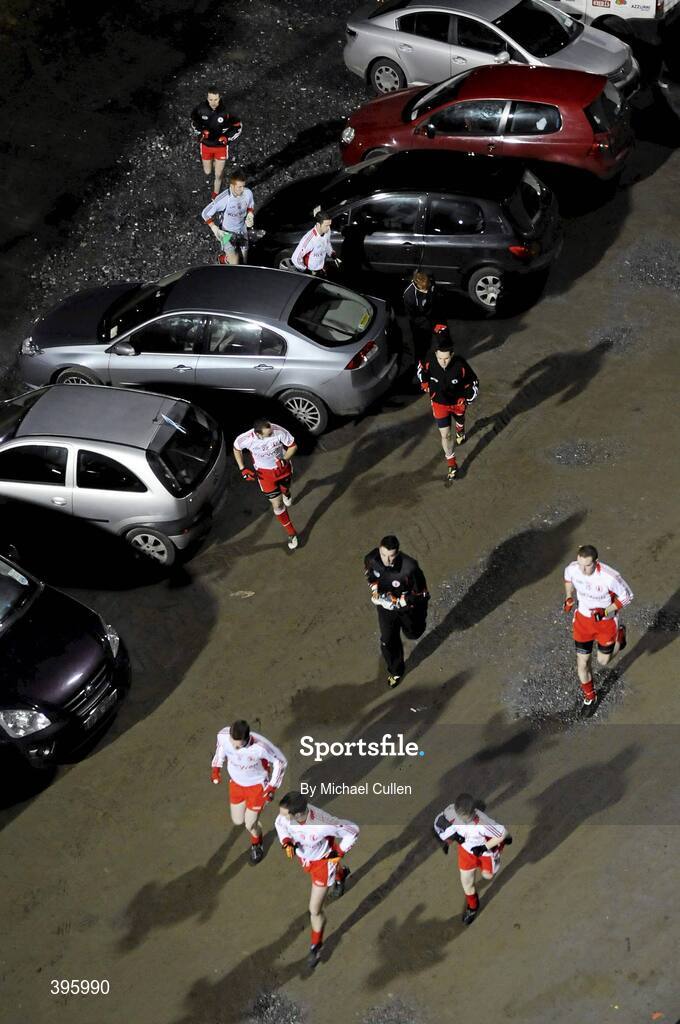 20 January 2010; The Tyrone team run through the cark park on their way from the dressing rooms. Barrett Sports Lighting Dr. McKenna Cup, Group B, Donegal v Tyrone, MacCumhaill Park, Ballybofey, Co. Donegal. Picture credit: Michael Cullen / SPORTSFILE