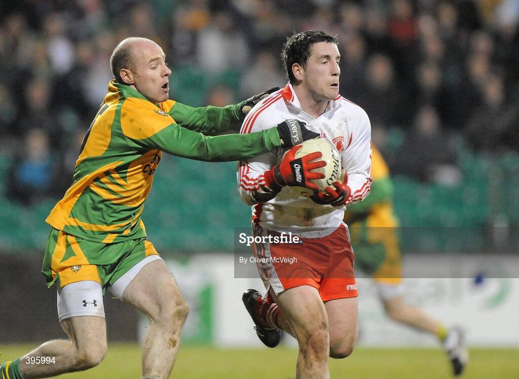 20 January 2010; Gareth Devlin, Tyrone, in action against James Keeney, Donegal. Barrett Sports Lighting Dr. McKenna Cup, Group B, Donegal v Tyrone, MacCumhaill Park, Ballybofey, Co. Donegal. Picture credit: Oliver McVeigh / SPORTSFILE