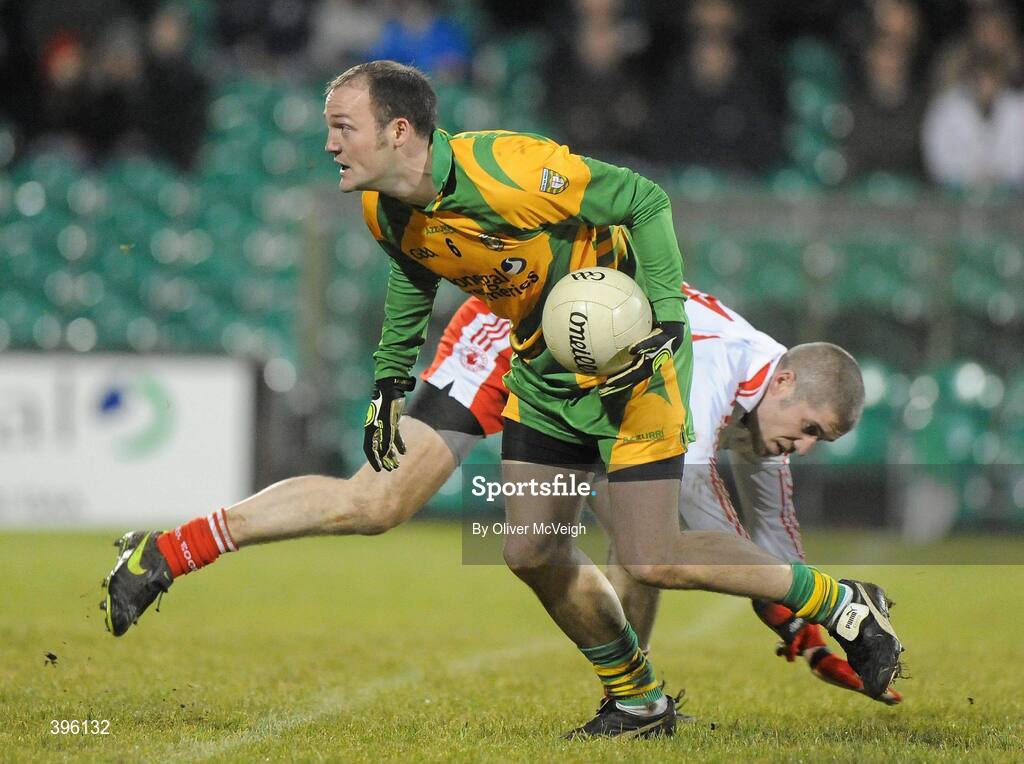 20 January 2010; Colm McFadden, Donegal, in action against Kevin Hughes, Tyrone. Barrett Sports Lighting Dr. McKenna Cup, Group B, Donegal v Tyrone, MacCumhaill Park, Ballybofey, Co. Donegal. Picture credit: Oliver McVeigh / SPORTSFILE