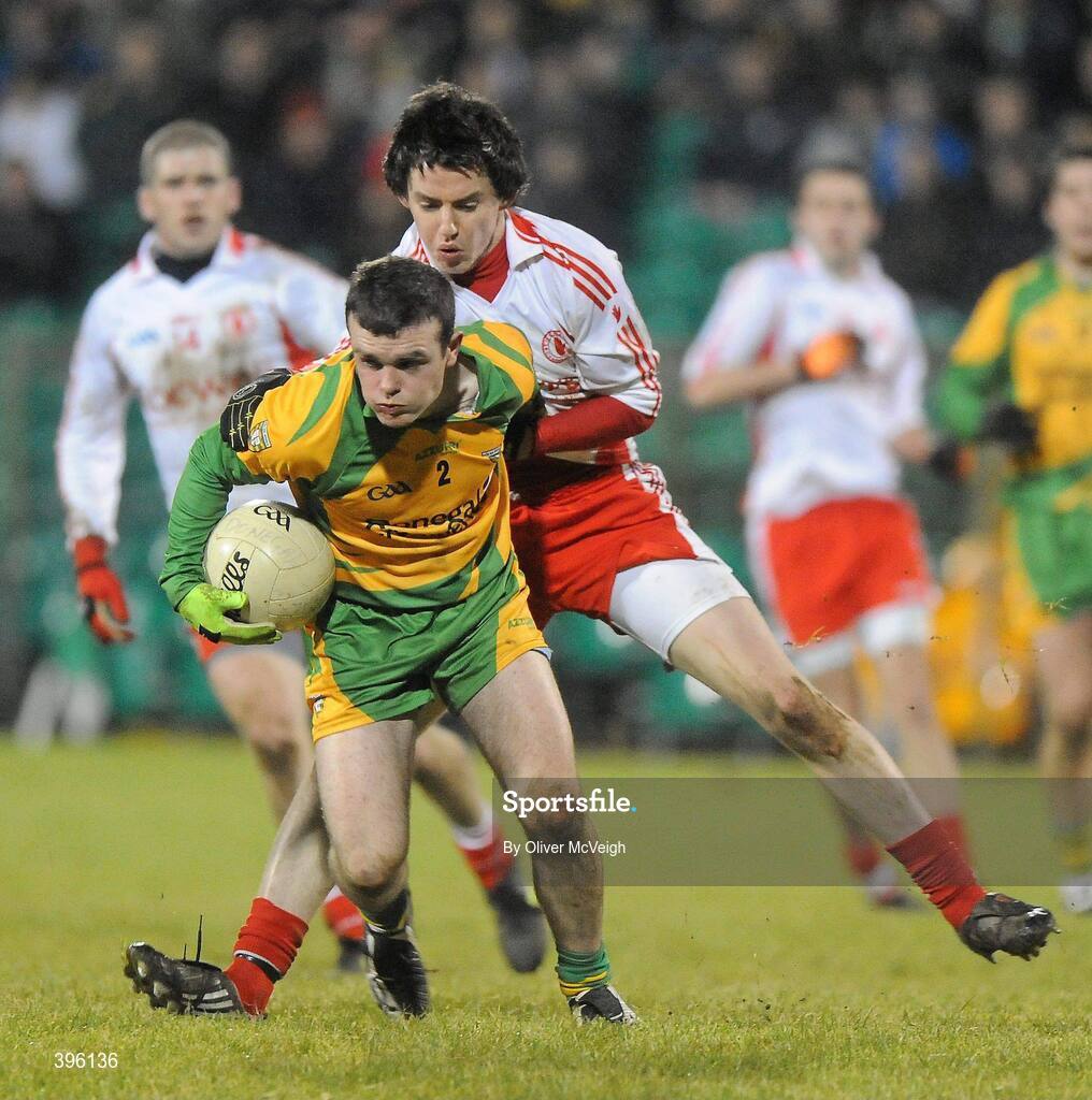20 January 2010; Adrian Hanlon, Donegal, in action against Matthew Donnelly, Tyrone. Barrett Sports Lighting Dr. McKenna Cup, Group B, Donegal v Tyrone, MacCumhaill Park, Ballybofey, Co. Donegal. Picture credit: Oliver McVeigh / SPORTSFILE