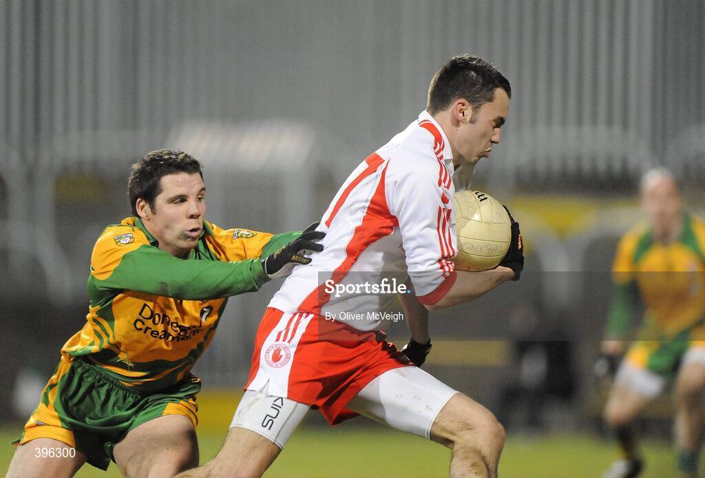 20 January 2010; Kyle Coney, Tyrone, in action against Kevin Cassidy, Donegal. Barrett Sports Lighting Dr. McKenna Cup, Group B, Donegal v Tyrone, MacCumhaill Park, Ballybofey, Co. Donegal. Picture credit: Oliver McVeigh / SPORTSFILE