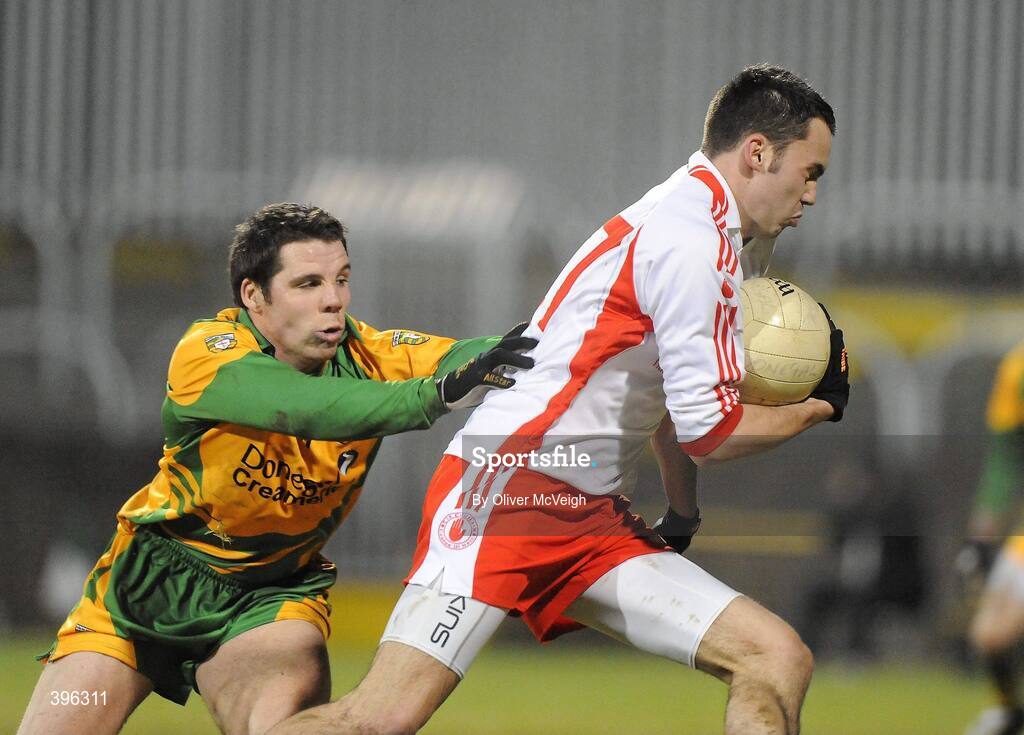 20 January 2010; Kyle Coney, Tyrone, in action against Kevin Cassidy, Donegal. Barrett Sports Lighting Dr. McKenna Cup, Group B, Donegal v Tyrone, MacCumhaill Park, Ballybofey, Co. Donegal. Picture credit: Oliver McVeigh / SPORTSFILE
