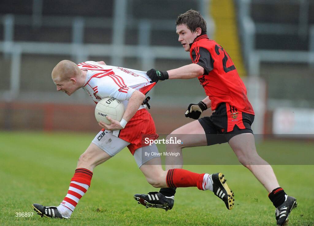 24 January 2010; Enda Lynn, Derry, in action against Stephen Toner, Down. Barrett Sports Lighting Dr. McKenna Cup, Group C, Derry v Down, Celtic Park, Derry. Picture credit: Oliver McVeigh / SPORTSFILE