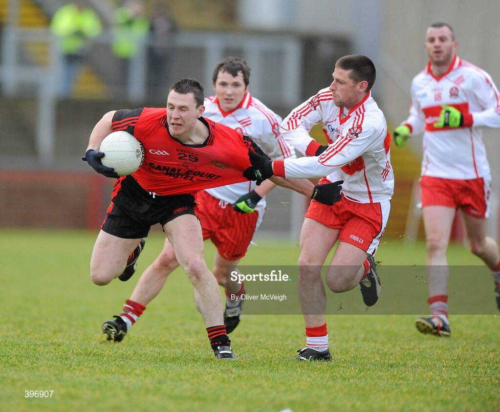 24 January 2010; John Clarke, Down, in action against Barry McGuigan, Derry. Barrett Sports Lighting Dr. McKenna Cup, Group C, Derry v Down, Celtic Park, Derry. Picture credit: Oliver McVeigh / SPORTSFILE