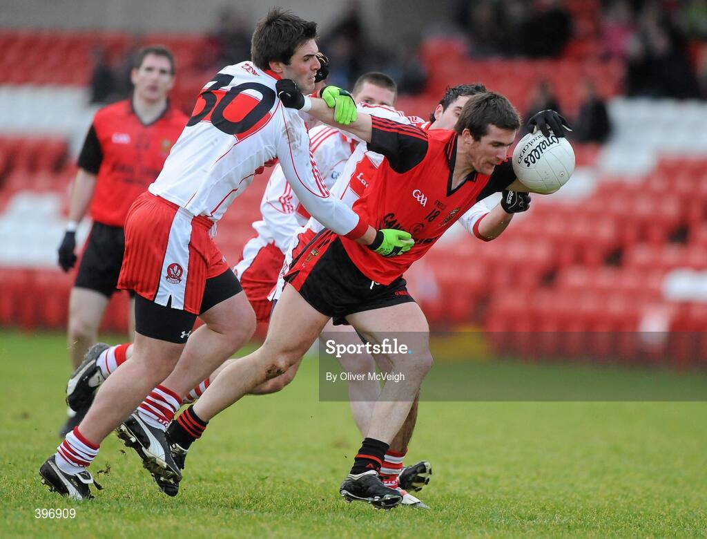 24 January 2010; Ronan Murtagh, Down, in action against Mark Lynch and Liam Hinphey, Derry. Barrett Sports Lighting Dr. McKenna Cup, Group C, Derry v Down, Celtic Park, Derry. Picture credit: Oliver McVeigh / SPORTSFILE