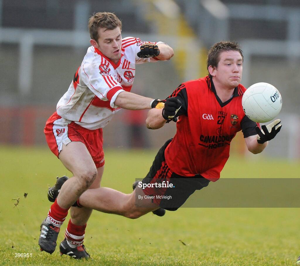 24 January 2010; Stephen Toner, Down, in action against Raymond Wilkinson, Derry. Barrett Sports Lighting Dr. McKenna Cup, Group C, Derry v Down, Celtic Park, Derry. Picture credit: Oliver McVeigh / SPORTSFILE